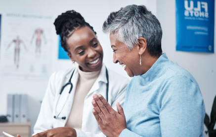 Image of a woman engaged in a discussion with a doctor in medical career